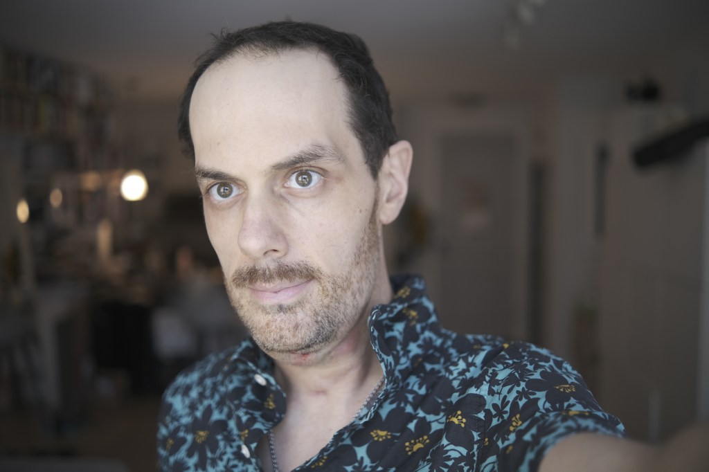 The author may be doing poorly, but he still exists, as of Aug. 2, 2023. 